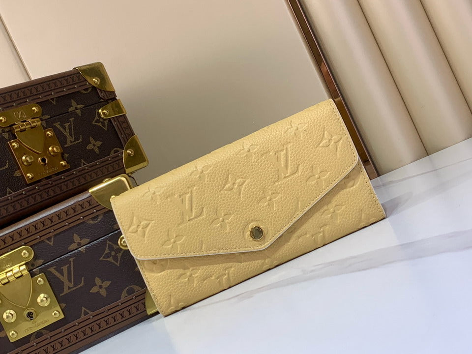 LV Embossed Monogram Long Wallet – Cream